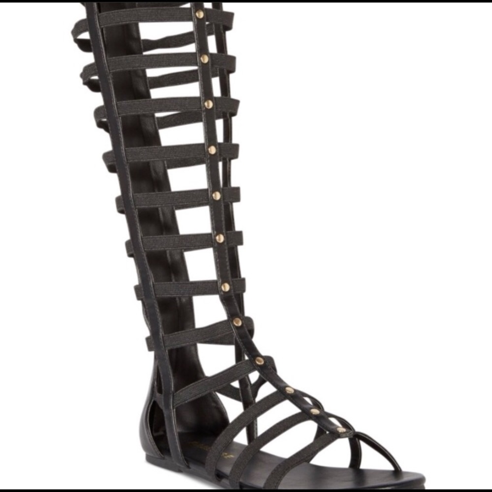 Black gladiator sandals.